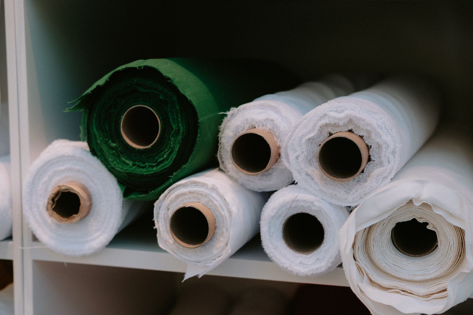 Commercial fabric rolls used to illustrate mixed apparel cloth.