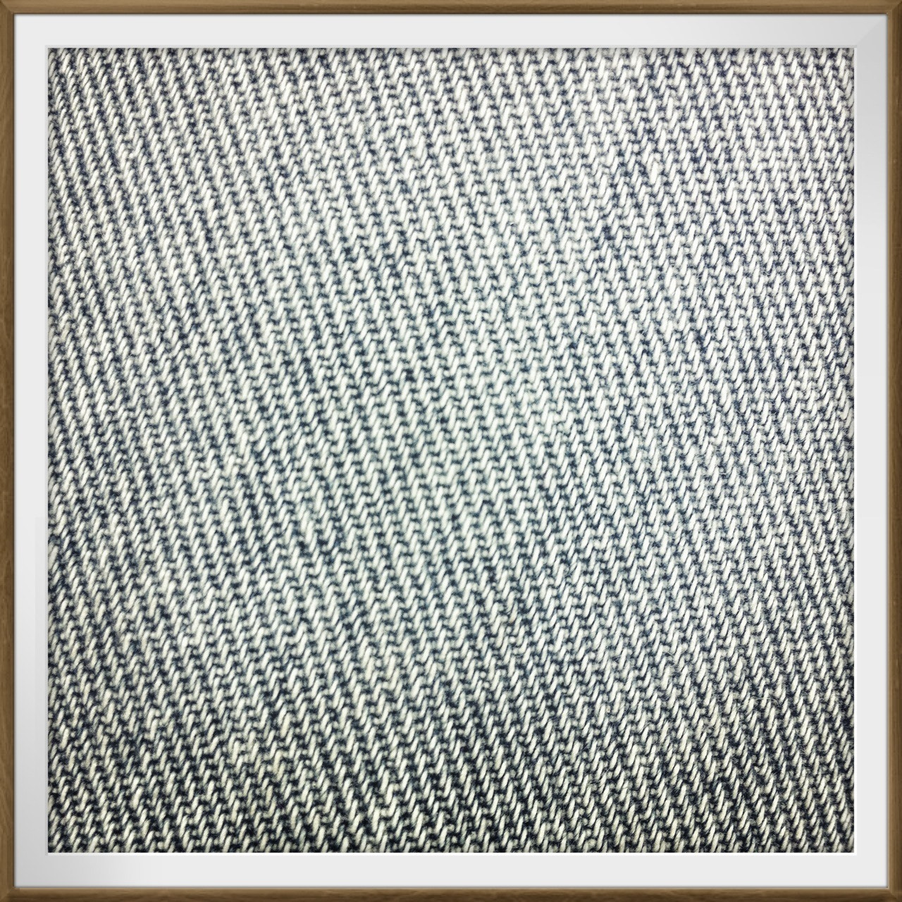 Close view of a twill weave associated with denim cloth.