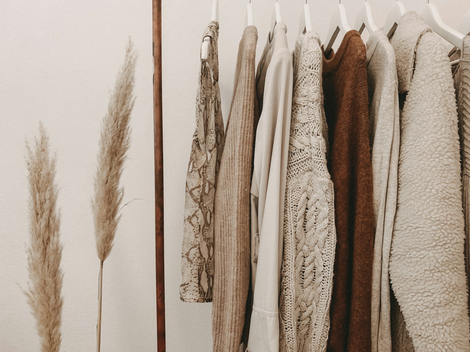Hanging knit layers used to illustrate sweats and midweight knits.